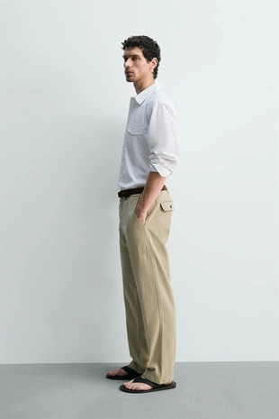 Брюки прямого кроя с эффектом потертости