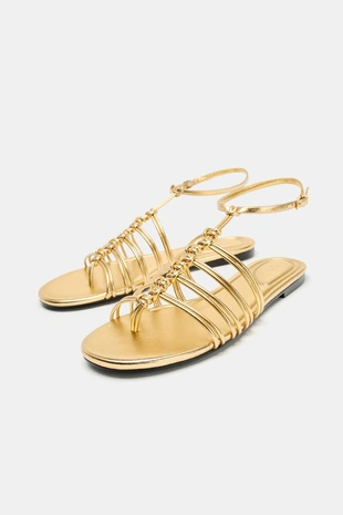 Сандалии на плоской подошве с металлическим блеском- Заказать в России