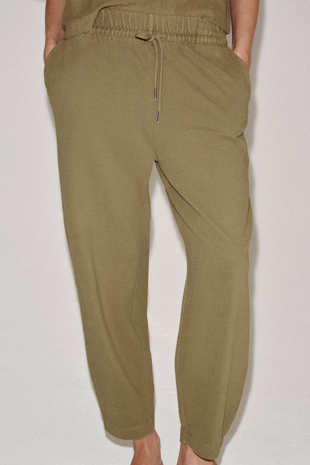 БРЮКИ С ЭФФЕКТОМ ПОТЕРТОСТИ