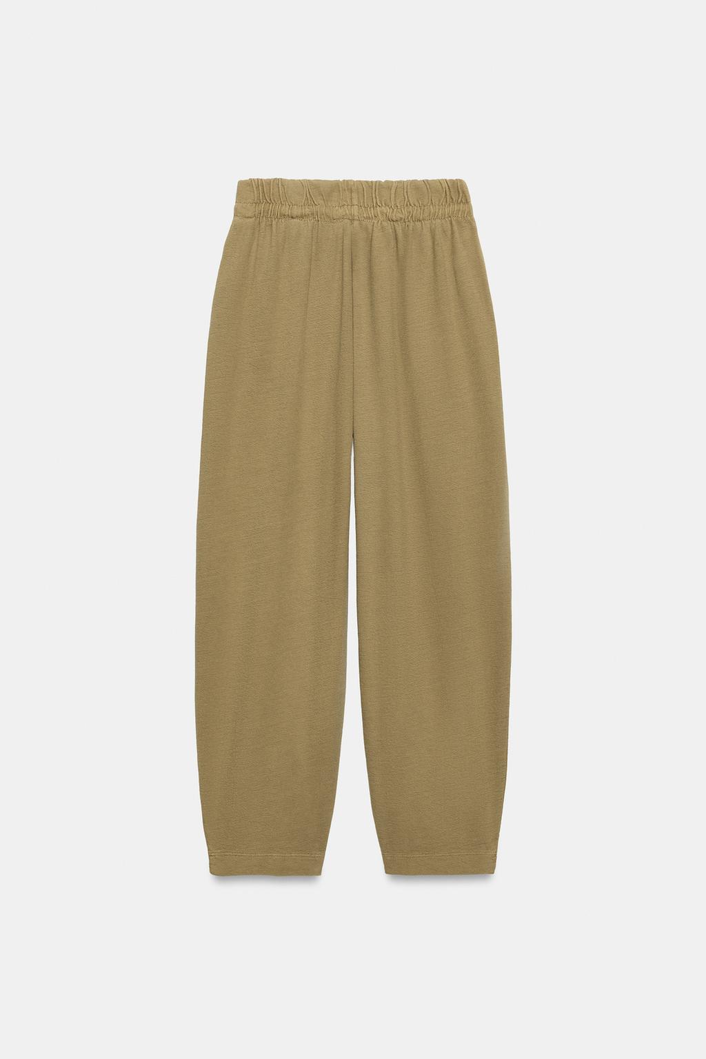 БРЮКИ С ЭФФЕКТОМ ПОТЕРТОСТИ