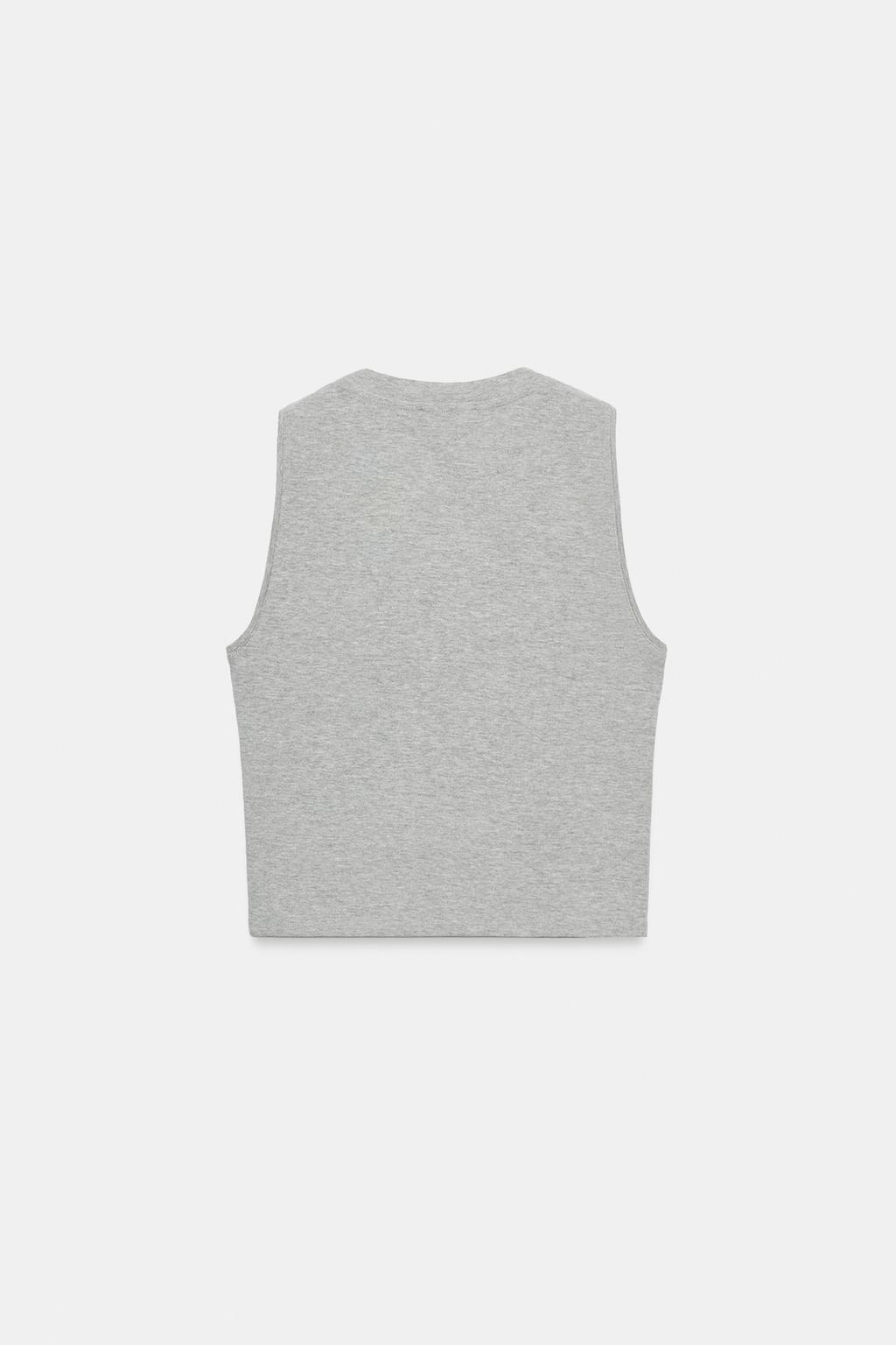 ТОП БЕЗ РУКАВОВ С ДЕКОРАТИВНОЙ СТРОЧКОЙ