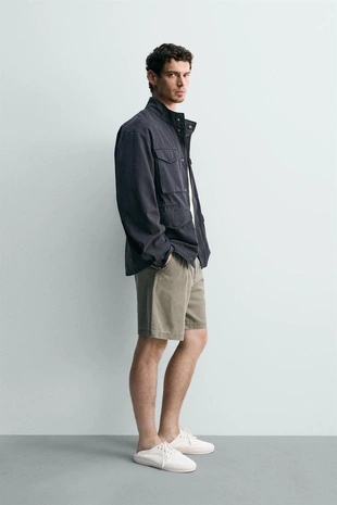 Куртка с карманами и эффектом потертости- Заказать в России