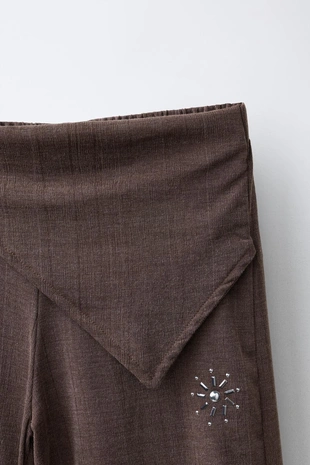 Брюки  с пуговицами- Заказать в России