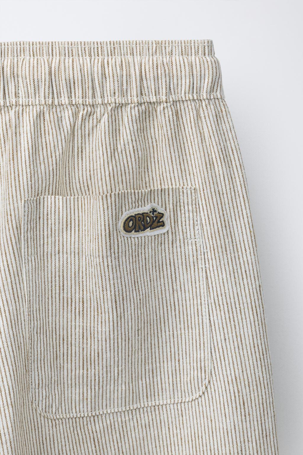 БРЮКИ В ПИЖАМНОМ СТИЛЕ В ПОЛОСКУ