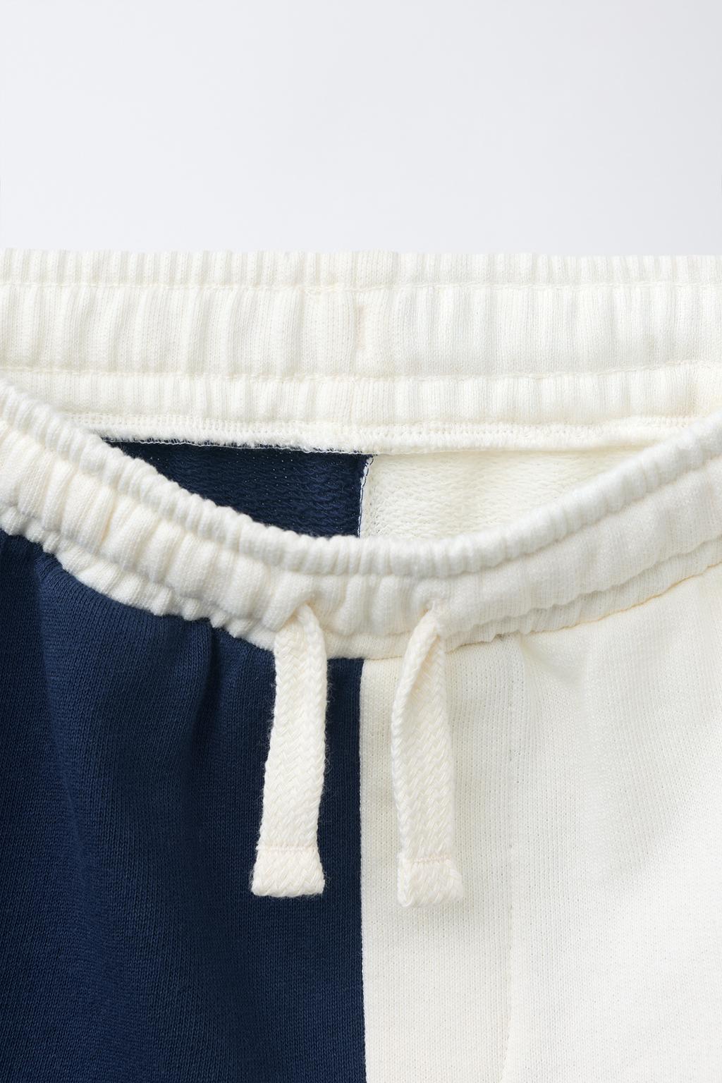 ШОРТЫ ИЗ МЯГКОЙ ТКАНИ С ЛОГОТИПОМ И БЛОКАМИ ЦВЕТА