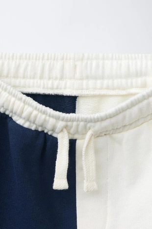 Шорты из мягкой ткани с логотипом и блоками цвета- Заказать в России