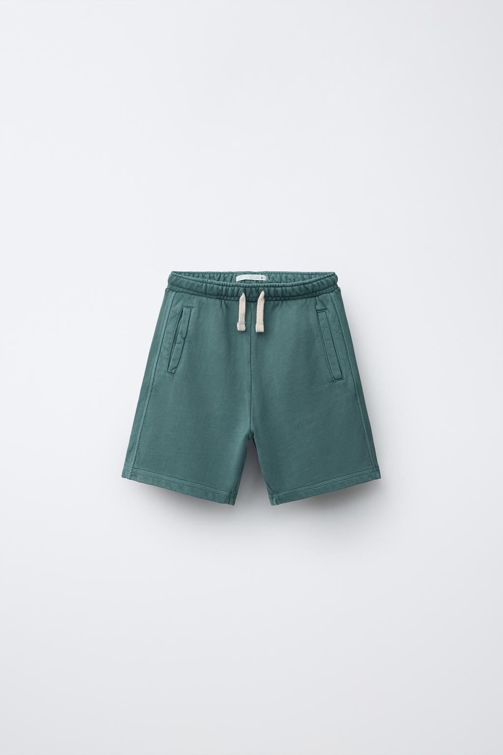 ШОРТЫ ИЗ МЯГКОЙ ТКАНИ С ЛОГОТИПОМ И ОКРАШИВАНИЕМ В ГОТОВОМ ВИДЕ