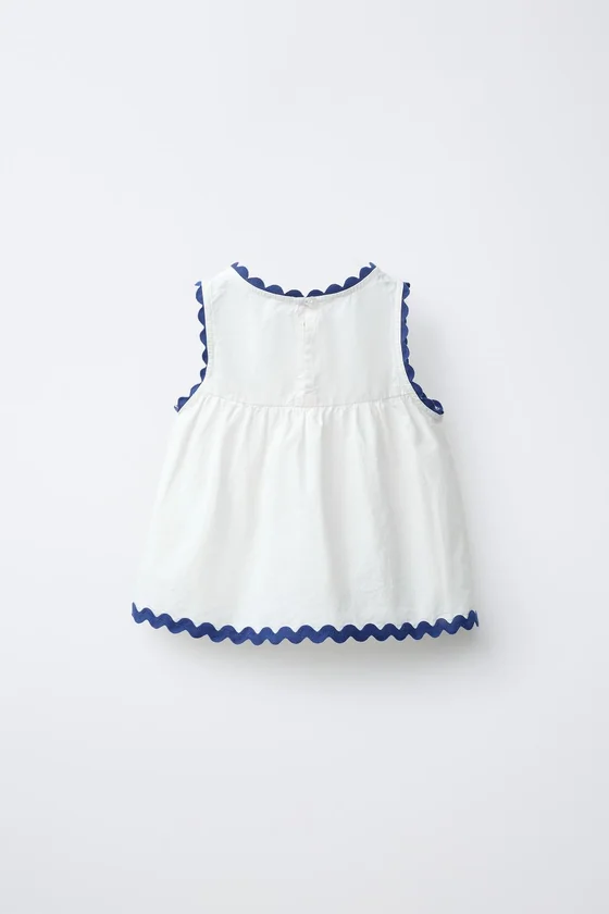 ТОП ИЗ ПОПЛИНА С ВОЛНИСТЫМ КОНТРАСТНЫМ КРАЕМ CASA LAWA X ZARA KIDS