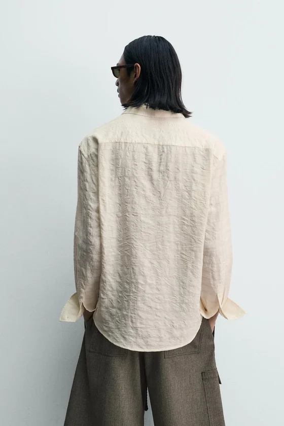 ПОЛО JACQUARD В КЛЕТКУ С ЖАТЫМ ЭФФЕКТОМ