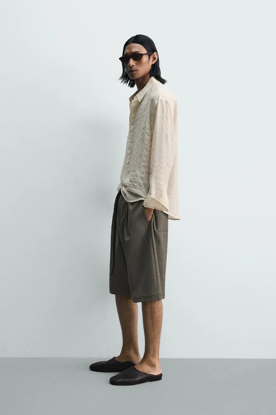 ПОЛО JACQUARD В КЛЕТКУ С ЖАТЫМ ЭФФЕКТОМ