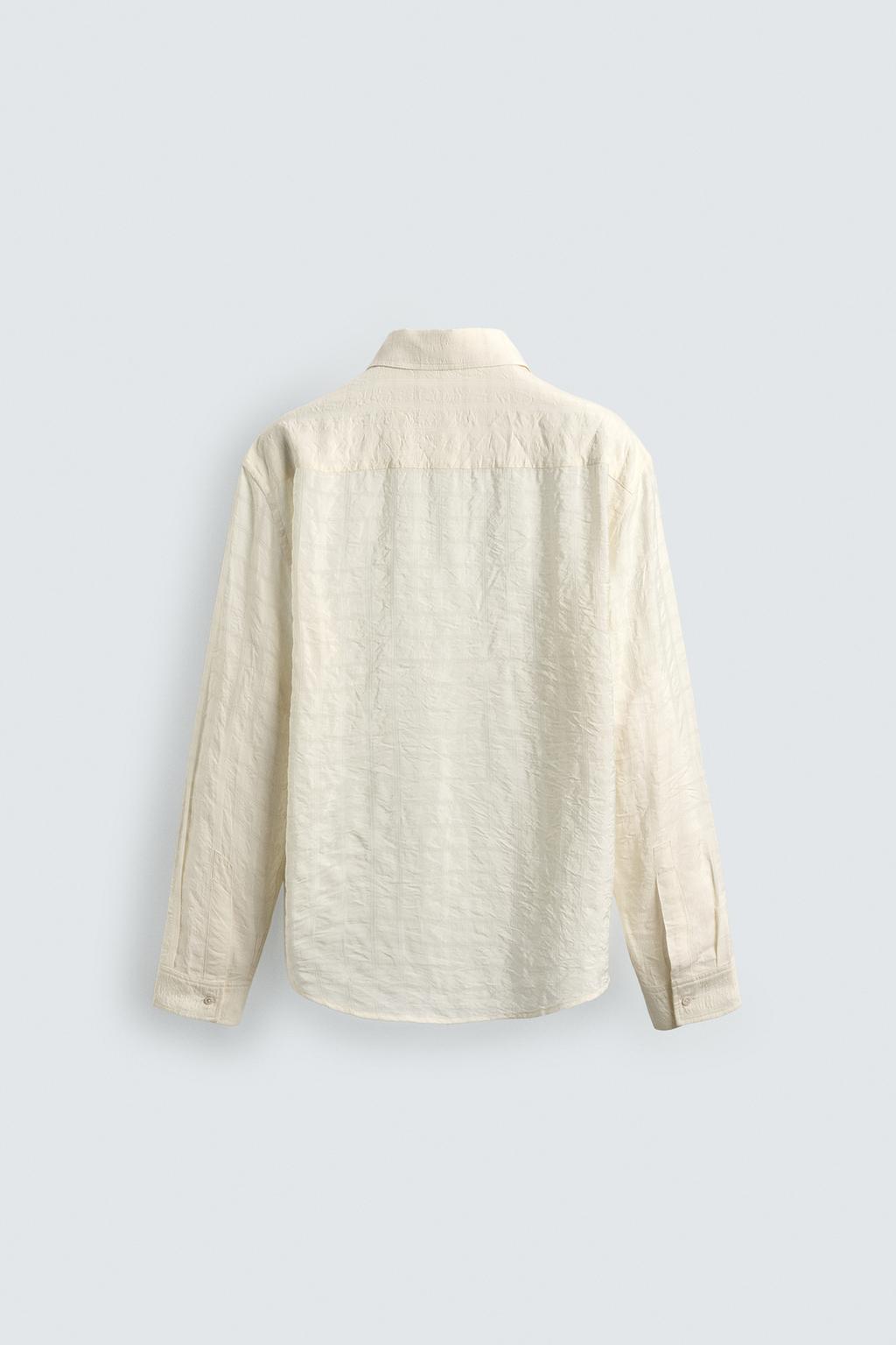 ПОЛО JACQUARD В КЛЕТКУ С ЖАТЫМ ЭФФЕКТОМ