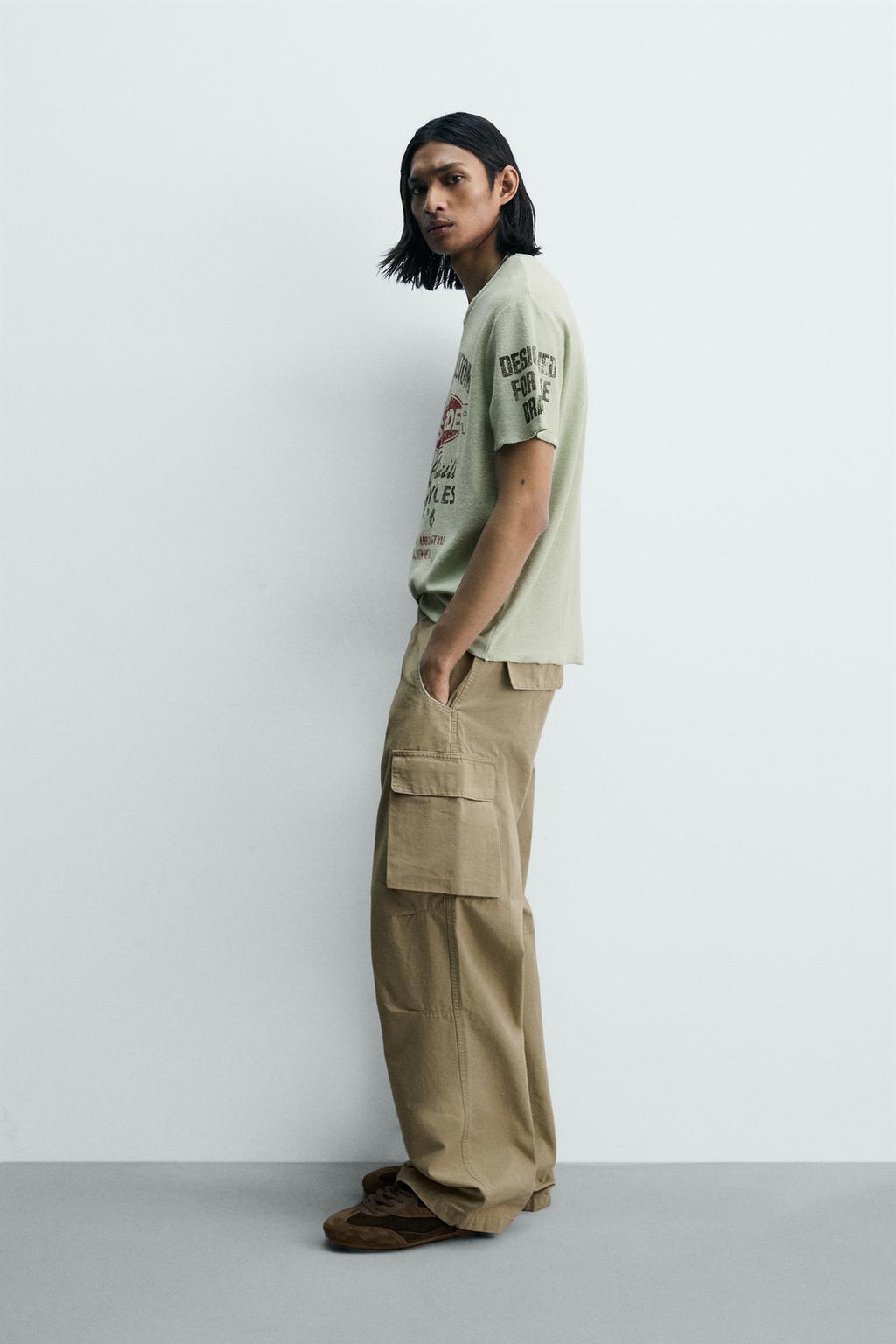 ФУТБОЛКА С ПРИНТАМИ И ЭФФЕКТОМ ПОТЕРТОСТИ