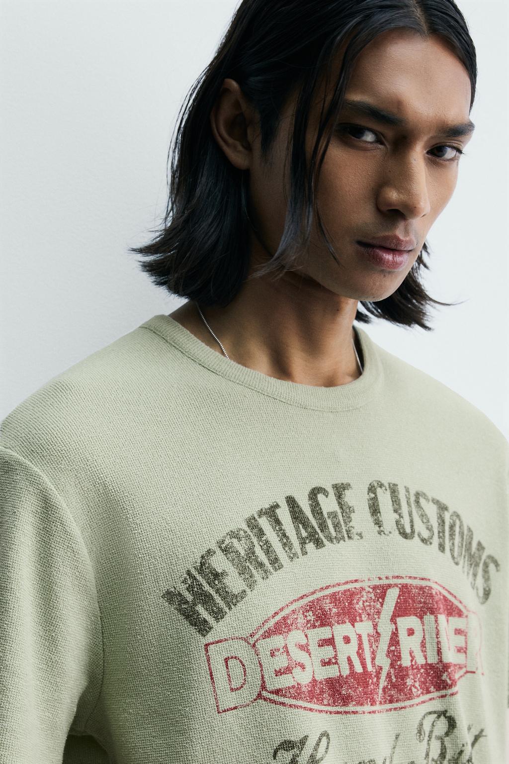 ФУТБОЛКА С ПРИНТАМИ И ЭФФЕКТОМ ПОТЕРТОСТИ