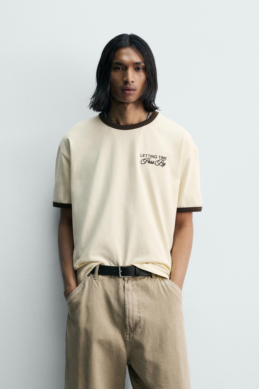 ФУТБОЛКА В РУБЧИК С КОНТРАСТНЫМИ НАДПИСЯМИ