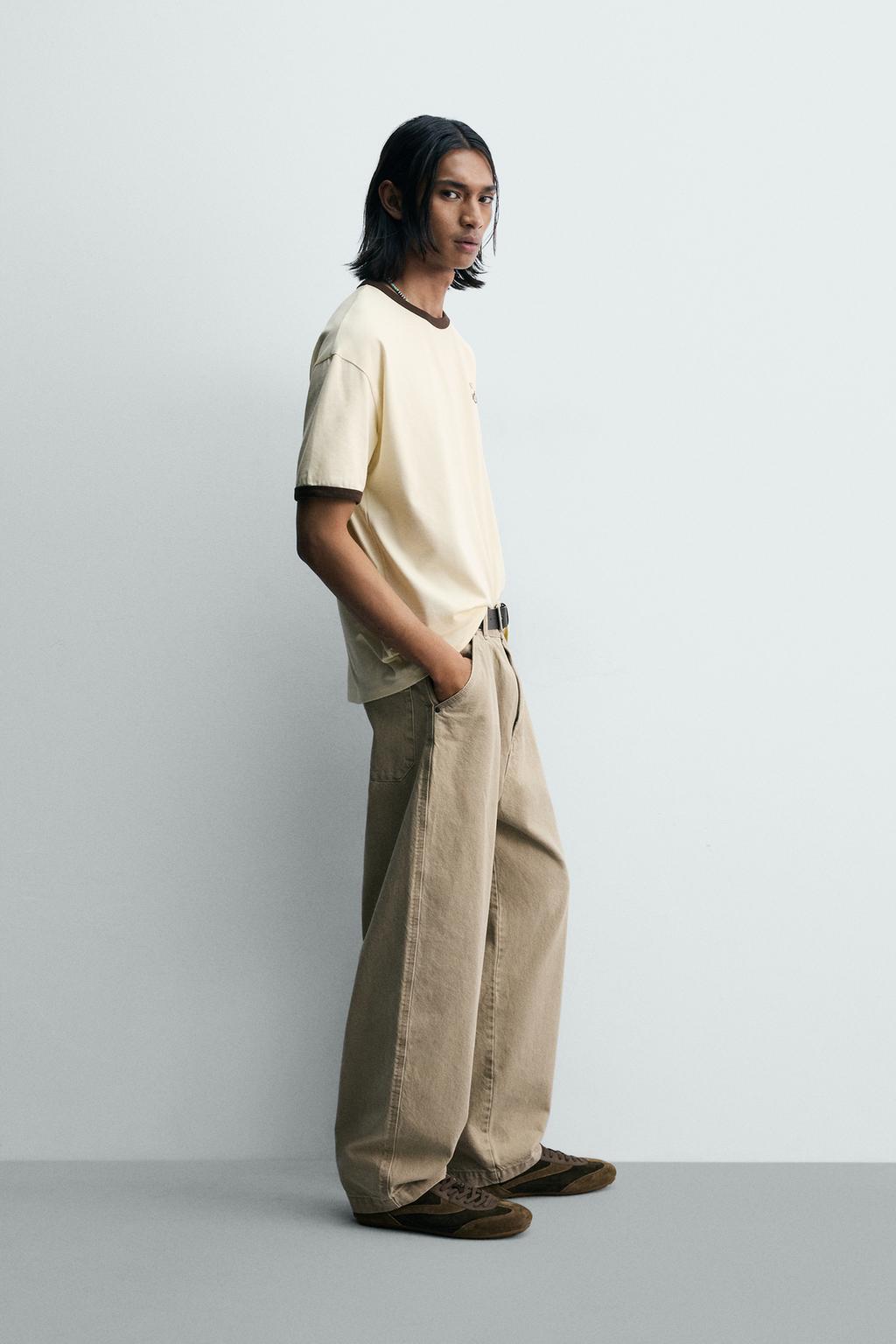 ФУТБОЛКА В РУБЧИК С КОНТРАСТНЫМИ НАДПИСЯМИ