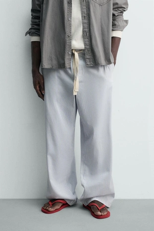 Брюки свободного кроя в полоску- Заказать в России