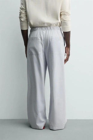 Брюки свободного кроя в полоску- Заказать в России