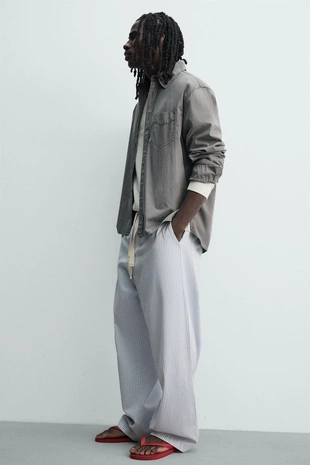 Брюки свободного кроя в полоску- Заказать в России