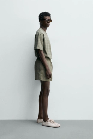 Укороченные шорты из высокотехнологичной ткани- Заказать в России