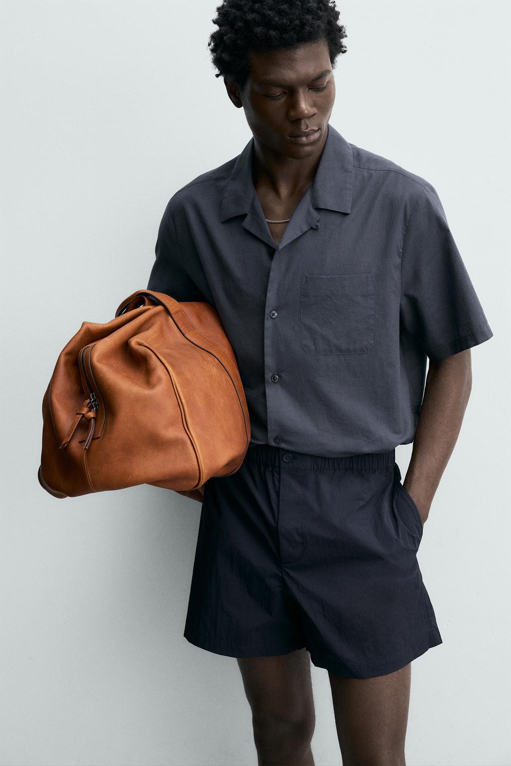 УКОРОЧЕННЫЕ ШОРТЫ ИЗ ВЫСОКОТЕХНОЛОГИЧНОЙ ТКАНИ