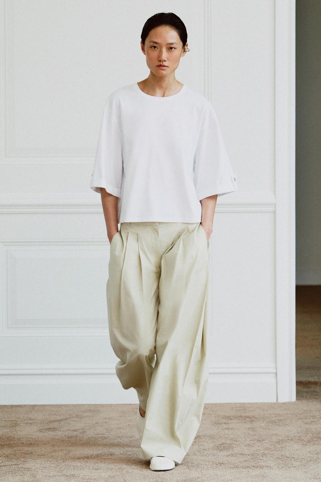 АСИММЕТРИЧНАЯ ФУТБОЛКА С ПУГОВИЦЕЙ