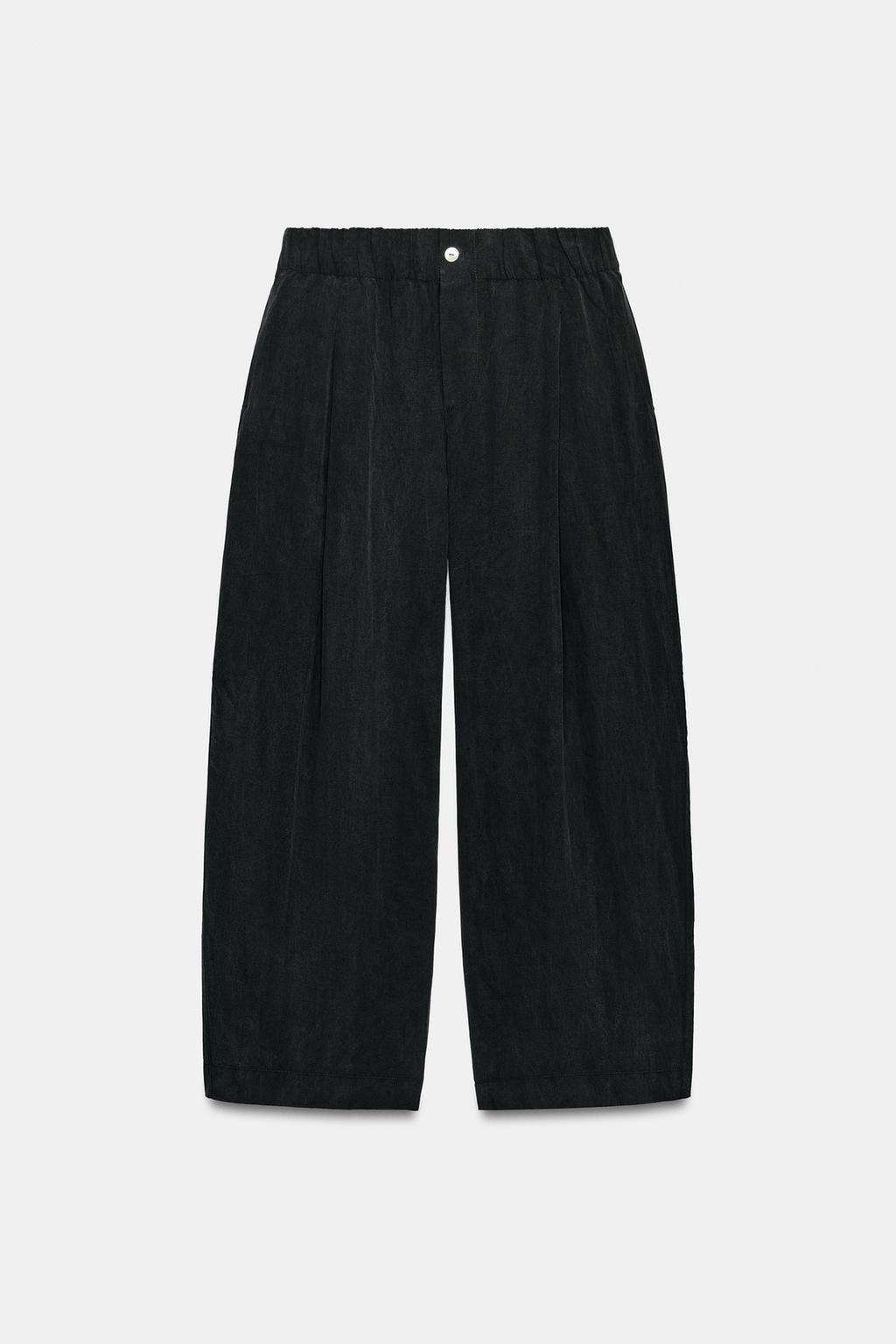 УКОРОЧЕННЫЕ СТРУЯЩИЕСЯ БРЮКИ