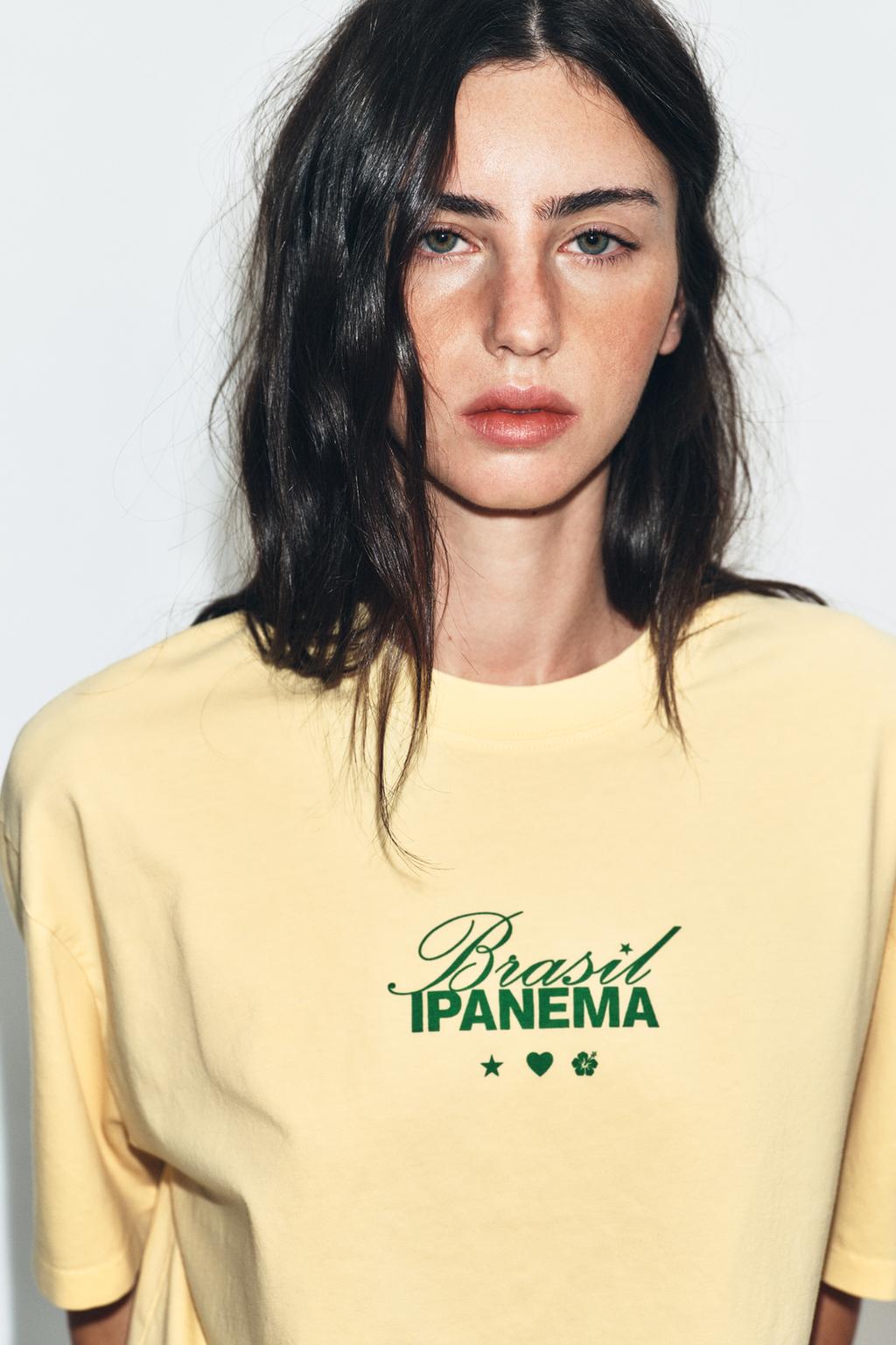 ФУТБОЛКА ИЗ ТКАНИ С ЭФФЕКТОМ ПОТЕРТОСТИ С НАДПИСЬЮ