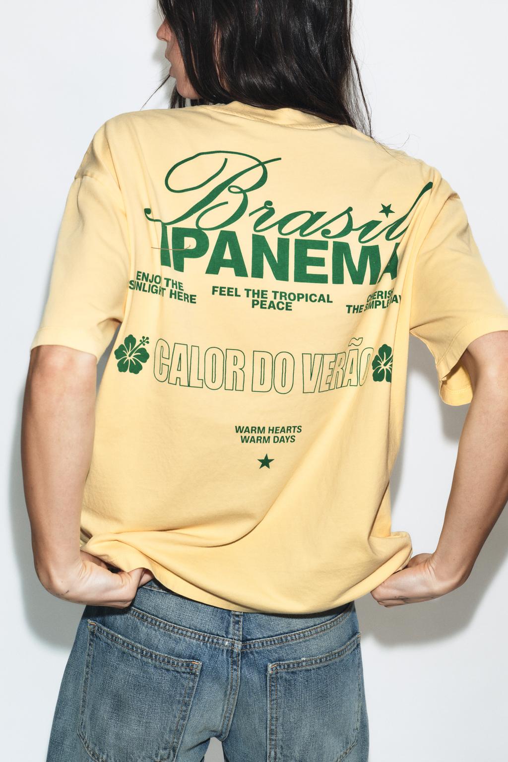 ФУТБОЛКА ИЗ ТКАНИ С ЭФФЕКТОМ ПОТЕРТОСТИ С НАДПИСЬЮ