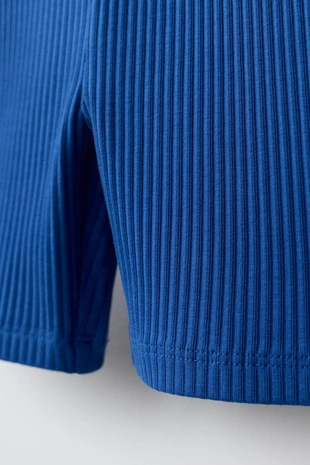 Велосипедные легинсы в рубчик с рельефной надписью