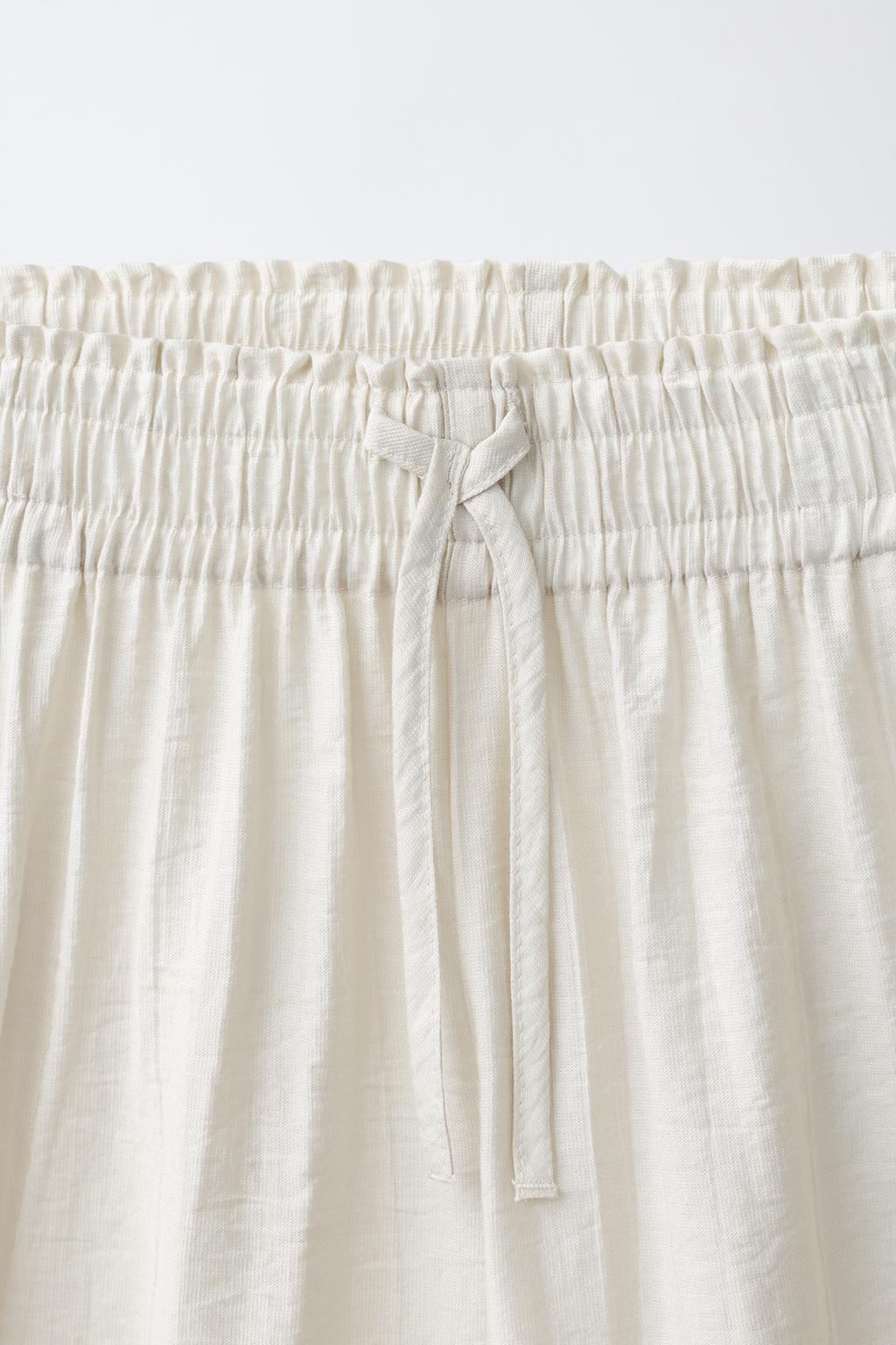 БРЮКИ  С ЖАТЫМ ЭФФЕКТОМ