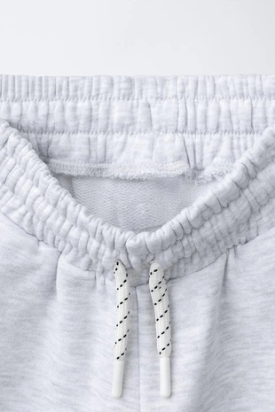 Джоггеры  с необработанным краем- Заказать в России