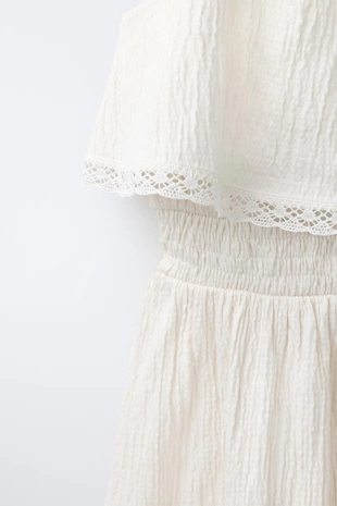 Платье с вышитыми цветами- Заказать в России