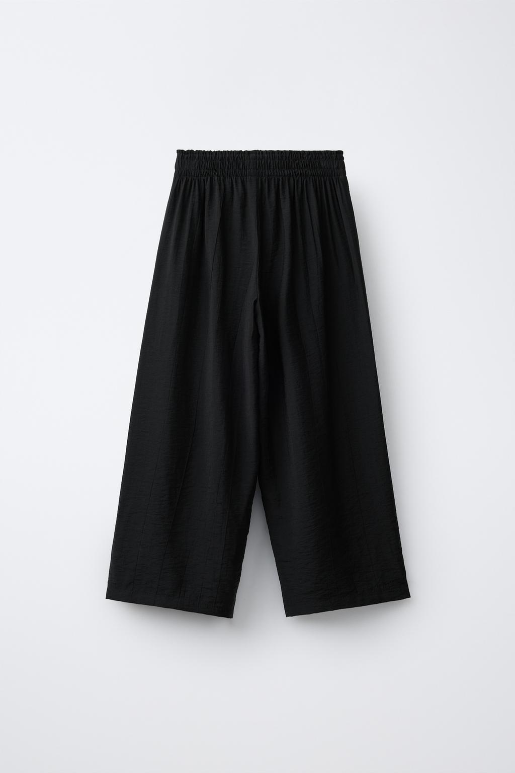 БРЮКИ  С ЖАТЫМ ЭФФЕКТОМ