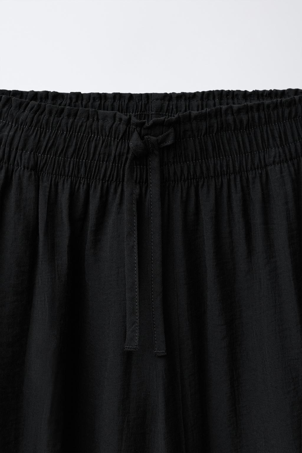 БРЮКИ  С ЖАТЫМ ЭФФЕКТОМ