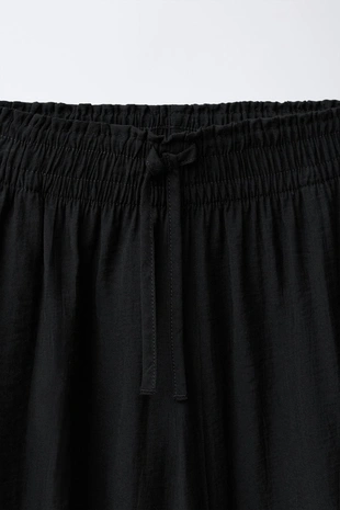 Брюки  с жатым эффектом- Заказать в России