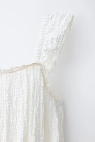 Длинный рельефный комбинезон с воланами- Заказать в России