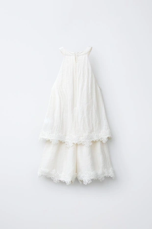 Короткий комбинезон халтер с вышивкой- Заказать в России