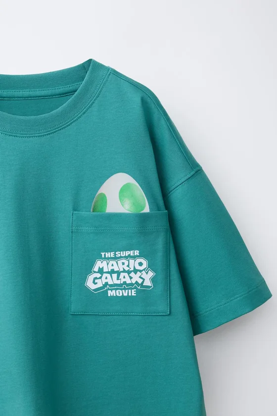 ФУТБОЛКА YOSHI SUPER MARIO BROS ™ © NINTENDO