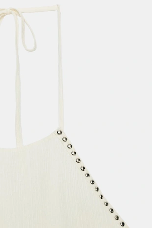 Топ с горловиной халтер, воланами и заклепками- Заказать в России