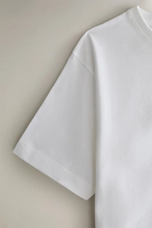 Хлопковая футболка с пуговицами- Заказать в России