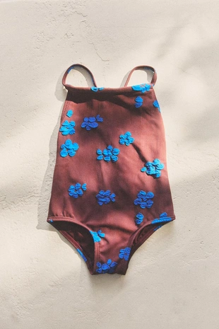 Детский купальник в цветочном рисунке- Заказать в России