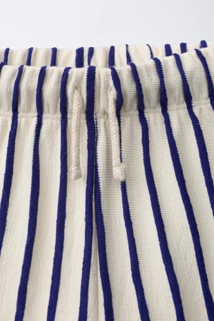 Комплект джоггеры, футболка и шорты с динозавром- Заказать в России