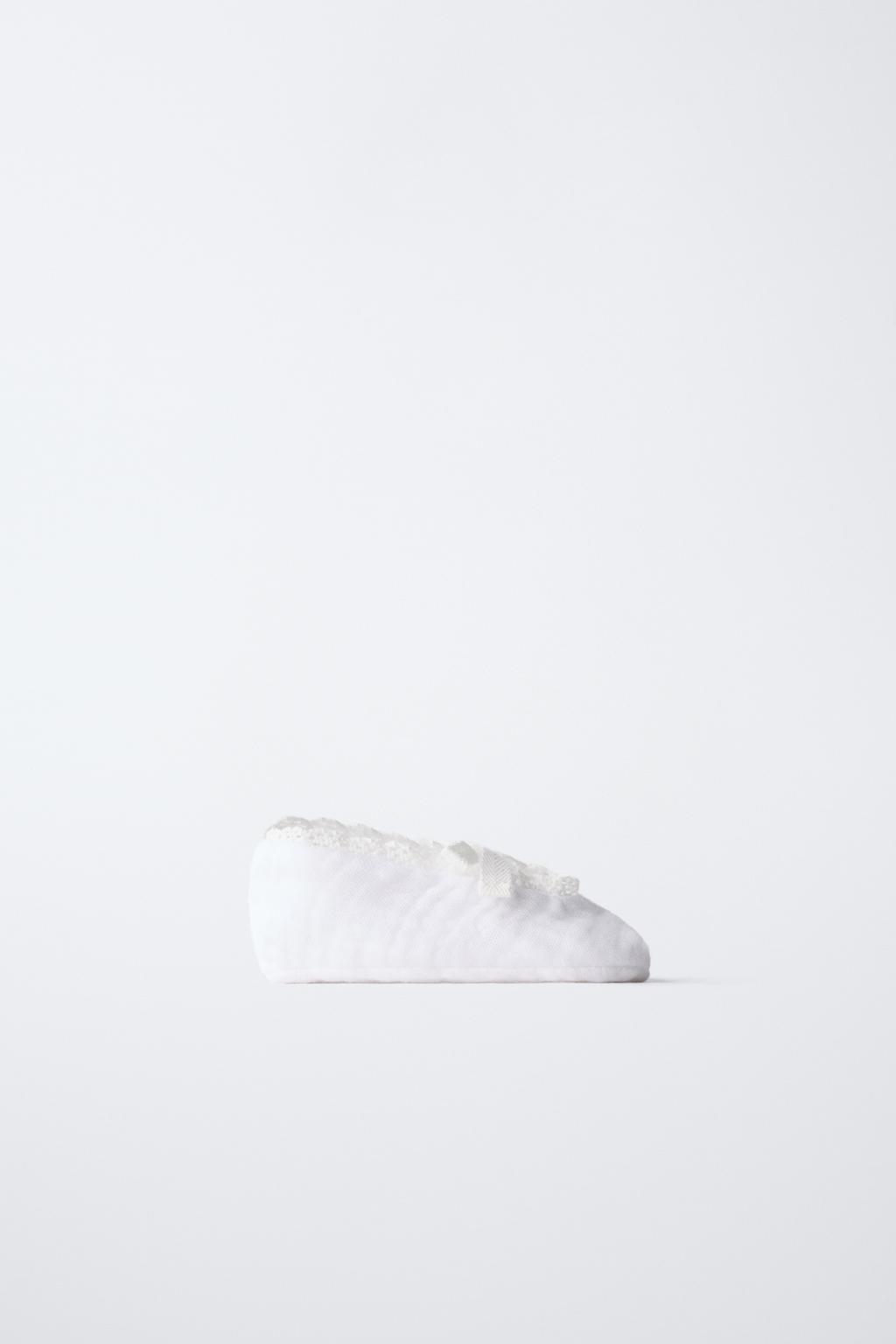 Текстильные ботиночки с бантом