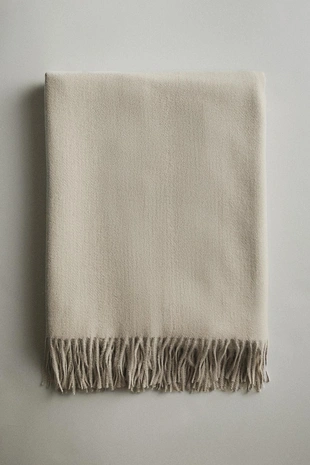 Плед с бахромой из мягкой ткани- Заказать в России