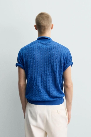 Поло из рельефного трикотажа с косами- Заказать в России