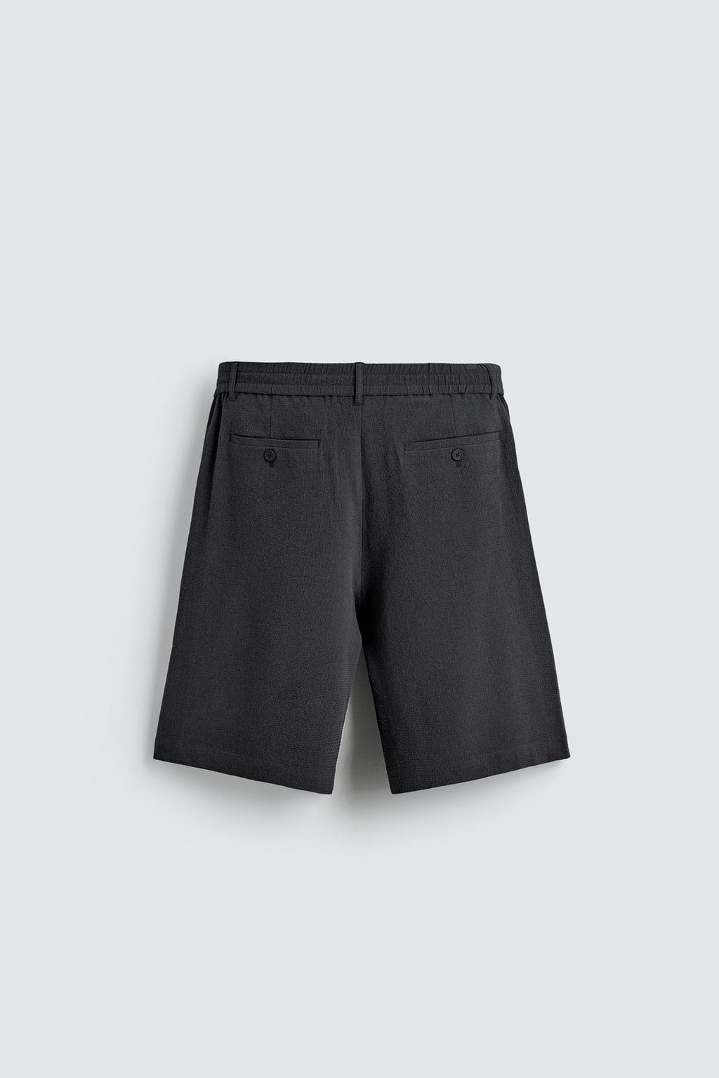 ШОРТЫ СВОБОДНОГО КРОЯ С НЕРОВНОЙ ТЕКСТУРОЙ И СКЛАДКАМИ