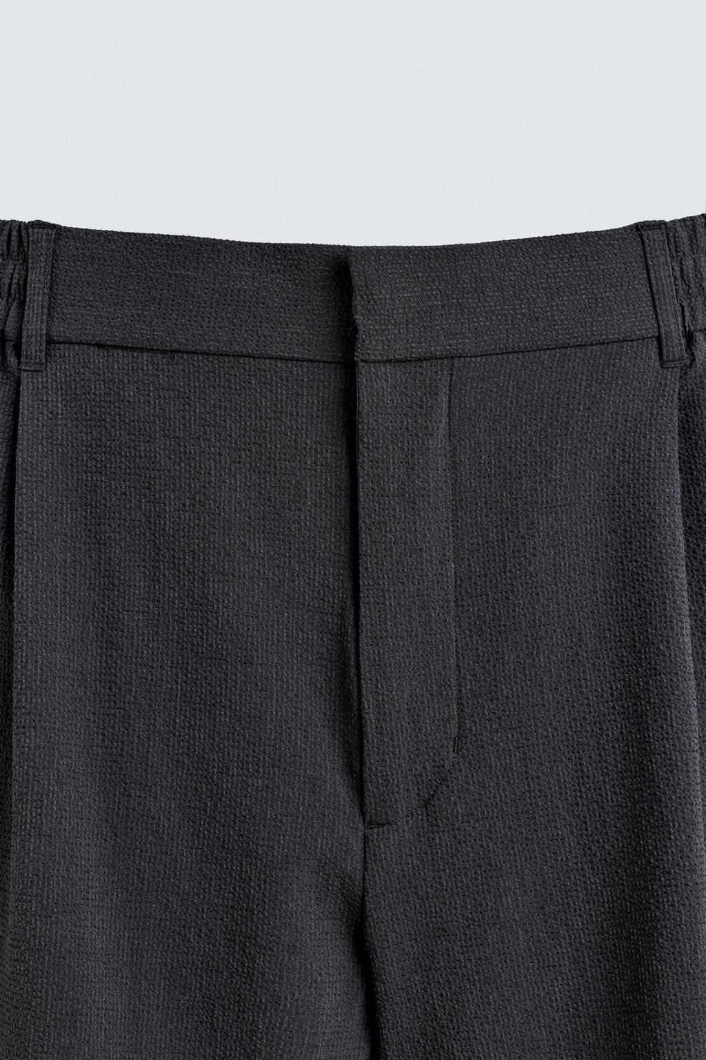 ШОРТЫ СВОБОДНОГО КРОЯ С НЕРОВНОЙ ТЕКСТУРОЙ И СКЛАДКАМИ