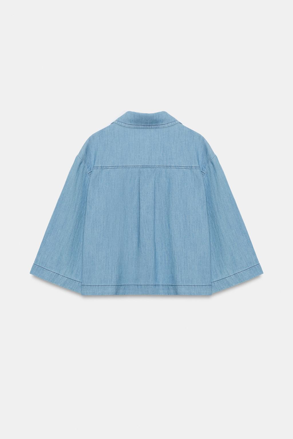 СВОБОДНАЯ БЛУЗА С V-ОБРАЗНЫМ ВЫРЕЗОМ