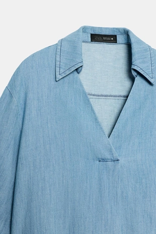 Свободная блуза с V-образным вырезом- Заказать в России