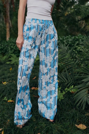 Широкие брюки в полоску- Заказать в России